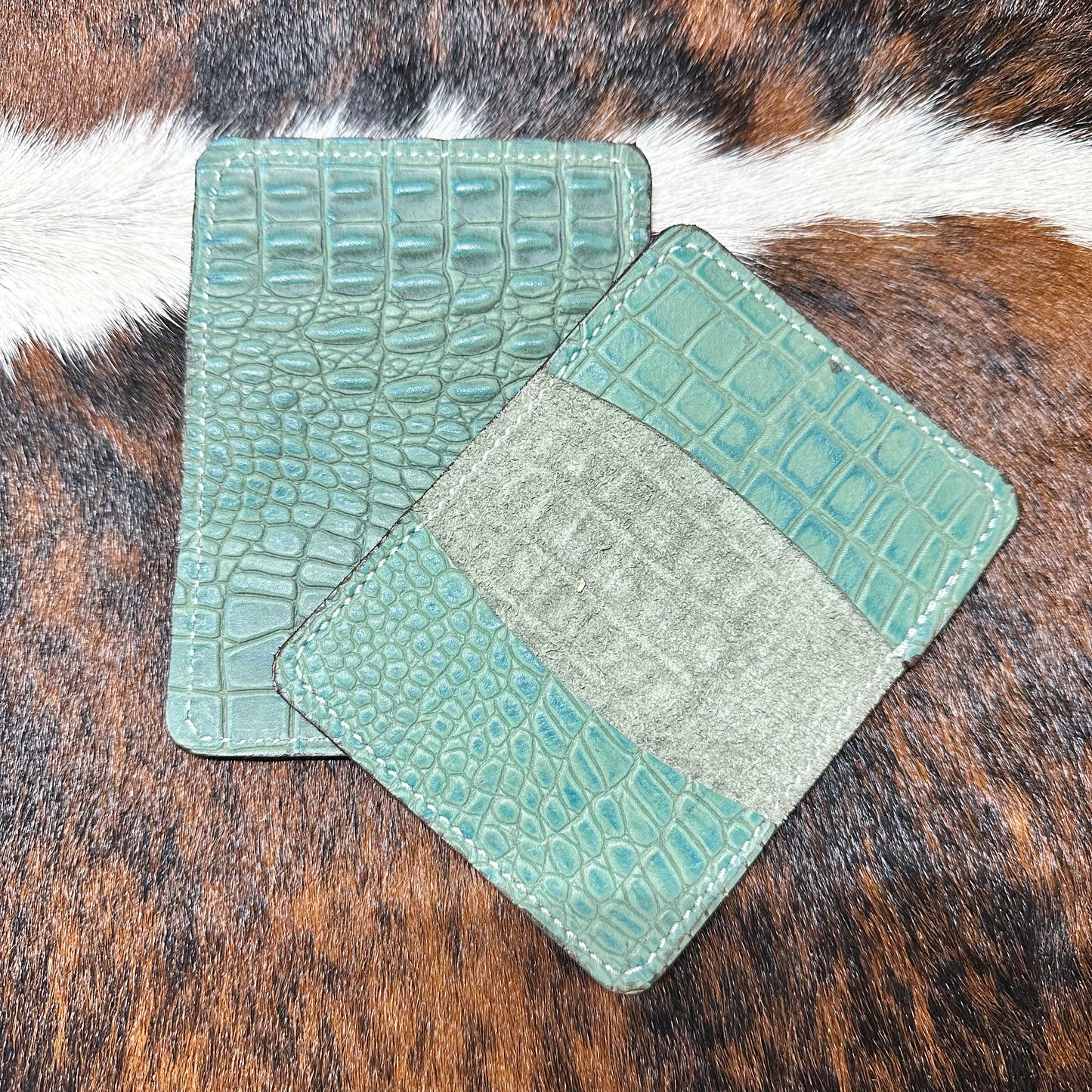 Embossed Teal Gator Card Sleeve